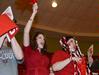 Nancy Lyerla and Cynthia Simmons cheer on the Lady Bulldogs during the final seconds of the semifinals game of the NAIA National Championship. - Photo by Beth Spain