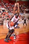 03/80/11 - Zeinab Chan goes up for a shot around her Shawnee State University opponent in the semifinals game of the NAIA National Championship. The Lady Bulldogs won the game and advanced to the finals. 