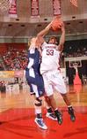 03/80/11 - Lavanda Ross goes up for a shot against her Shawnee State University opponent.