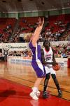 03/78/11 - Zeinab Chan moves in for a shot while her Westminster College opponent attempts to block her in the quarterfinals of the NAIA National Championship. The Lady Bulldogs advanced to the semifinals with a win of 78-61.