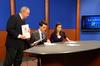 David S. Dockery, president of the university, looks over the newscast line-up before the 500th Jackson 24/7 broadcast begins. The show aired after the tornado hit Union's campus in 2008. - Photo by Beth Spain