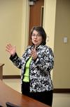 Mary Anne Poe, director of Center for Just and Caring Communities, speaks during the Town & Gown in Providence Hall. - Photo by Deanna Santangelo