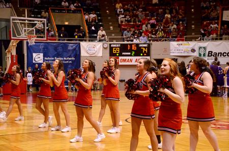 Union cheerleaders entertain the crowd during a time-out in the second round game of the NAIA National Championship.