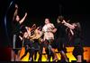 The 14th annual Variety Show skit team celebrates another great showing at the end of the performance.  - Photo by Abigail Harris