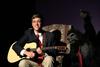 Josh Shelley, freshman business major, plays guitar during the Lambda Chi Alpha small group performance at the 14th annual Variety Show. - Photo by Deanna Santangelo