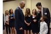 Tony Dungy, Super Bowl winning coach, visits with Mark Campbell, women's basketball coach, and his family. - Photo by Abigail Harris