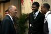 04/108/11 - Tony Dungy, Super Bowl winning coach, greets Antoine Hall, junior DMS major, and Skyler Vaden, junior sports management major, during the Roy L. White Golf and Gala.