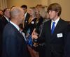 04/18/11 - Union soccer player, Jacob Long, meets Super Bowl winning coach, Tony Dungy, who was the keynote speaker at Union's annual Roy L. White Golf and Gala.