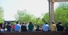 Dr. Paul Jackson, professor of Biblical studies, teaches on Barefoots Joe's patio, allowing students to enjoy class outside on a beautiful sunny day. - Photo by Ebbie Davis
