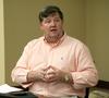Bob Alvey, member of Jackson-Madison county school board, speaks on a panel at the last night of the Town & Gown lecture series on the subject of Children and Community. - Photo by Deanna Santangelo