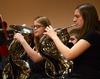 Rebecca Henderson, sophomore music education major, and Betsy Olson, junior physics major, play the french horn as the Union University Symphonic Band gives their Spring Concert in the Savage Memorial Chapel.  - Photo by Victoria Stargel