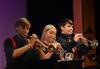 Chase Techentin, junior music major, Jana Matlock, junior music education major, and Will Armour, freshman music major, play the trumpet during the Jazz Band concert.  - Photo by Victoria Stargel