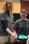 Brenda Peirson, professor of chemistry, helps a student with a chemistry lab experiment.  - Photo by Kristi McMurry
