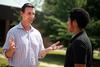 5/11/11 - Roman Williams, assistant professor of sociology, chats with Matt Arnold, sophomore Christian studies major.  - Kristi McMurry