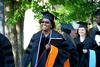 5/21/11 - Tijuana Terrell, doctor of nursing practice graduate, walks to the Great Lawn for spring graduation.  - Deanna Santangelo
