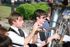Chase Techentin, junior music major, plays the trumpet alongside Joe Lindamood, sophomore music education major, during spring graduation. - Photo by Jacob Moore