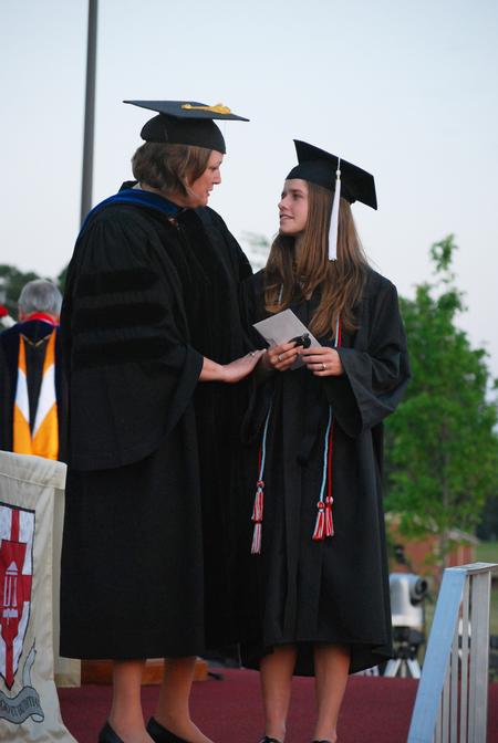 Carla Sanderson, provost and executive vice president, speaks to Kate Cline, recipient of the Elizabeth Tigrett Medal.