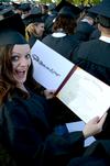 Jessica Davenport, elementary education and learning foundations graduate, poses with her diploma at spring graduation. - Photo by Ebbie Davis