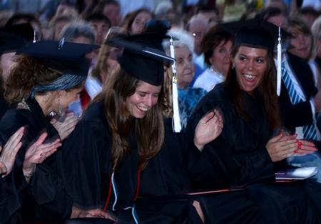 Kate Cline, history and English graduate, reacts after being called at the 100th Tigrett Medal recipient at spring graduation.