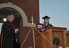 Senior Class President Betsy Davis presents the senior class gift of a new "Sugar Shack" to David S. Dockery, president of the university. "Sugar Shack" is the nickname given to a pavilion that was destroyed in the 2008 tornado. - Photo by Morris Abernathy
