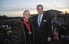David S. Dockery, president of the university, and Dr. Albert Mohler, president of Southern Baptist Theological Seminary, pose together after the Spring Commencement.  Dr Mohler's daughter Mary Katherine Mohler received her Bachelor of Arts in History earlier in the evening. - Photo by Morris Abernathy