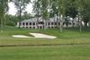 TPC Deere Run Clubhouse with 18th green in the foreground. - Photo by Steven Aldridge