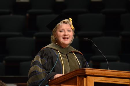 Sheila Mitchell, dean of the School of Pharmacy, delivers the commencement address at Union's summer graduation ceremony at West Jackson Baptist Church.