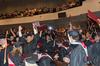 Union graduates celebrate at the end of Union's summer graduation ceremony. - Photo by Morris Abernathy