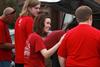Joy Greene, assistant director of experiential education, talks to the family of a new student before unloading their car during New Student Move-in.  - Photo by Kristi McMurry