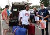 William Murray, senior engineering major, helps Casey Withers, freshman engineering major, move into his dorm in Heritage Complex during New Student Move-in. - Photo by Zac Calvert