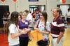 8/19/11 - Ali Jeffries, freshman, talks with Gretchen Endres, freshman nursing major, and her family during registration for New Student Move-in.