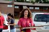 Megan Daniel, senior nursing major, assists incoming students moving in during New Student Move-in.  - Photo by Ebbie Davis