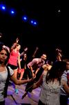 Focus leaders entertain the incoming freshmen at their annual Focus Show, by acting out skits and singing songs.  - Photo by Ebbie Davis