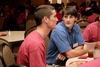 Georg Pingen, assistant professor of engineering, talks with Casey Withers, freshman engineering major, during Dinner with your Department in the Carl Grant Event Center. - Photo by Deanna Santangelo