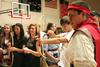 Eli Joiner (center), freshman pre-med major, shoots an arrow in a game during the LifeGroup presentations for new students.  - Photo by Deanna Santangelo