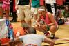 Sarah Parks, junior athletic training major, times students as they do push-ups during the LifeGroup presentations. - Photo by Deanna Santangelo