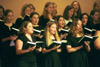 The Choral Union, conducted by Richard Joiner,  performs <i>All People That on Earth do Dwell</i> at Union's Fall Convocation 2002. - Photo by Jim Veneman