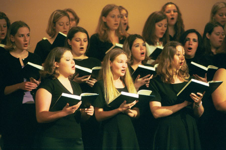 The Choral Union, conducted by Richard Joiner,  performs <i>All People That on Earth do Dwell</i> at Union's Fall Convocation 2002.