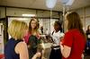 New students mingle at the Student Activity Fair held in the Penick Academic Center, allowing the new students to get involved with campus life.  - Photo by Ebbie Davis