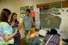 Life Group leaders encourage incoming freshmen to sign up for Life Groups at the Student Activity Fair. - Photo by Ebbie Davis