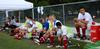 Bulldog soccer players watch as their teammates play Wallace State Community College.  - Photo by Ebbie Davis