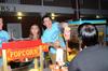 Matt Parker, senior business major, serves popcorn before Movie on the Lawn, hosted by SAC in the Watters quad.  - Photo by Ebbie Davis