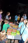 SAC serves candy during Movie on the Lawn in the residence life complex. - Photo by Ebbie Davis