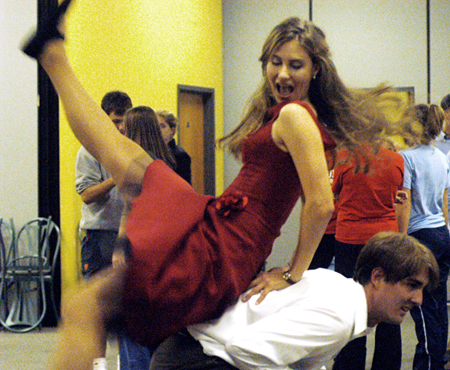 Seniors Laura Lee Moore and Nick Ellis lead an educational class on swing dancing during Swing Nite.