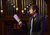 Brad Carrington, senior church music major, reads a passage from Romans during chapel. - Photo by Jacob Moore