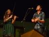 Members from the folk-pop band Seryn sing harmony while playing the violin and ukulele during their performance in Barefoots Joe. - Photo by Jacob Moore