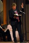 Nigel Goodwin reads a passage of scripture at the music department's presentation of "Sounding through the Centuries" during the KJV400 festival: Legacy and Impact. - Photo by Anne Richoux