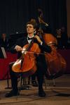 Griffin Browne plays the cello along with the orchestra at the music department's presentation of "Sounding through the Centuries" during the KJV400 festival: Legacy and Impact.  - Photo by Anne Richoux