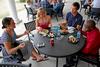 Jessie Shubert, Rebecca Stephens, Caleb Creel, and Edwin Kurgat enjoy the Labor day picnic at the Bowld Student Commons.  - Photo by Anne Richoux