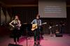 Student musicians lead students and family members in "Jesus Paid It All" during Family Weekend chapel. - Photo by Jacob Moore